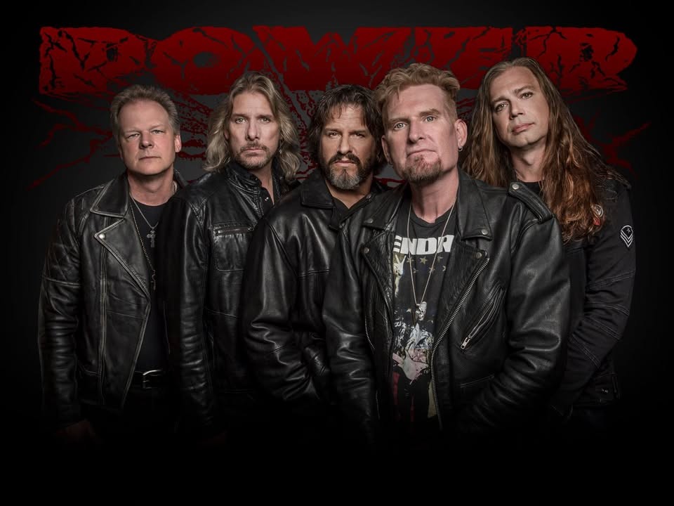 POWER promo photo: five members in black leather under the red POWER logo