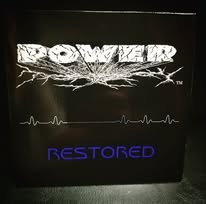 Cover art for the album Restored, POWER logo above a heartbeat line